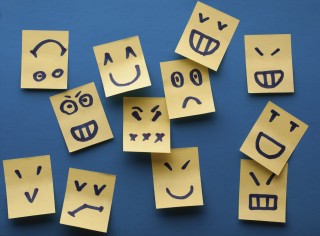 Smilies yellow stickers on blue background
